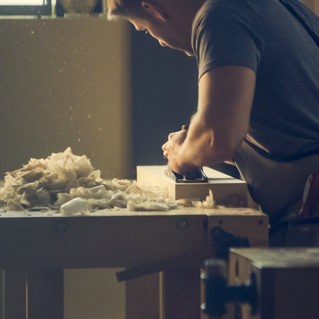 Craftsman working with tools and materials