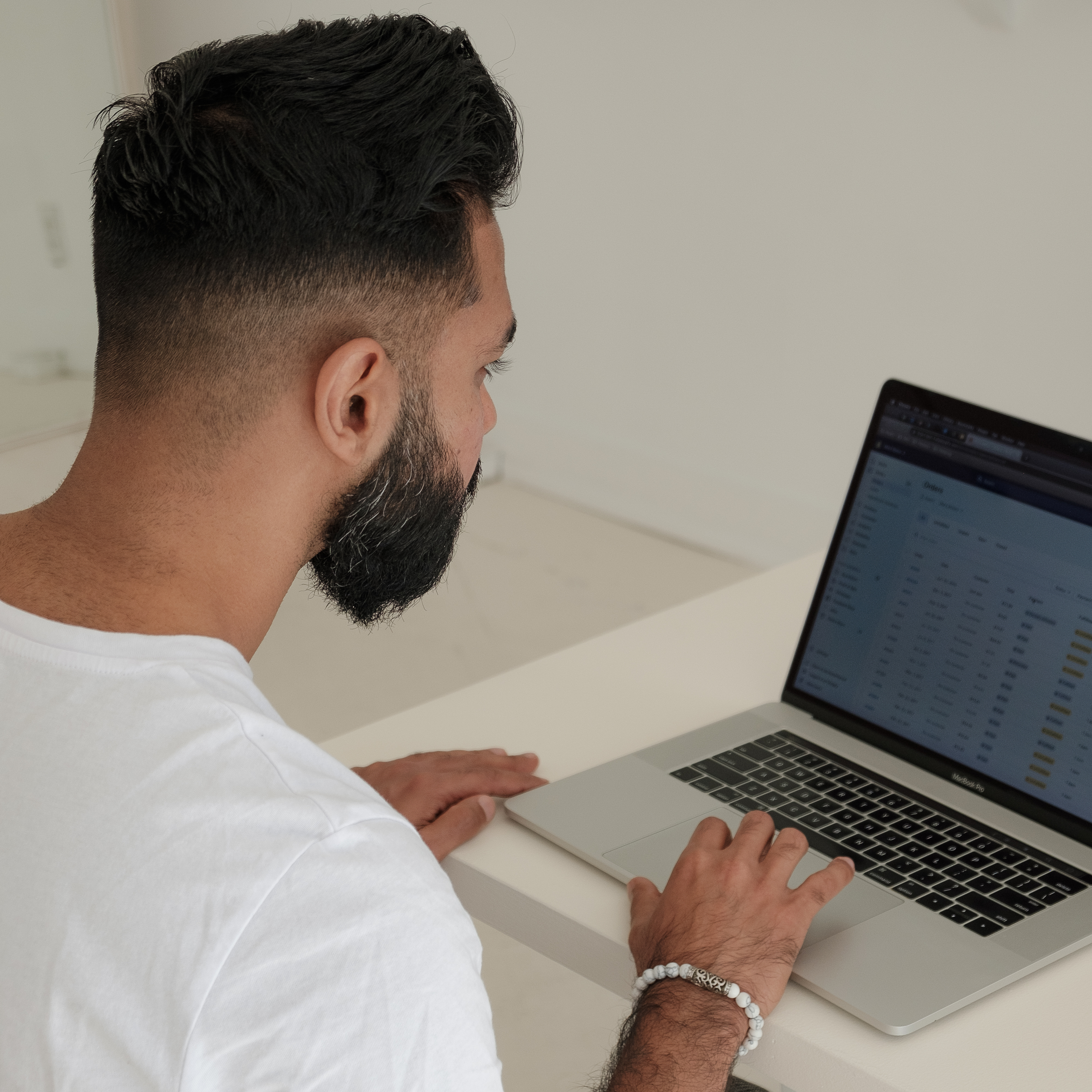 Business owner reviewing orders and systems